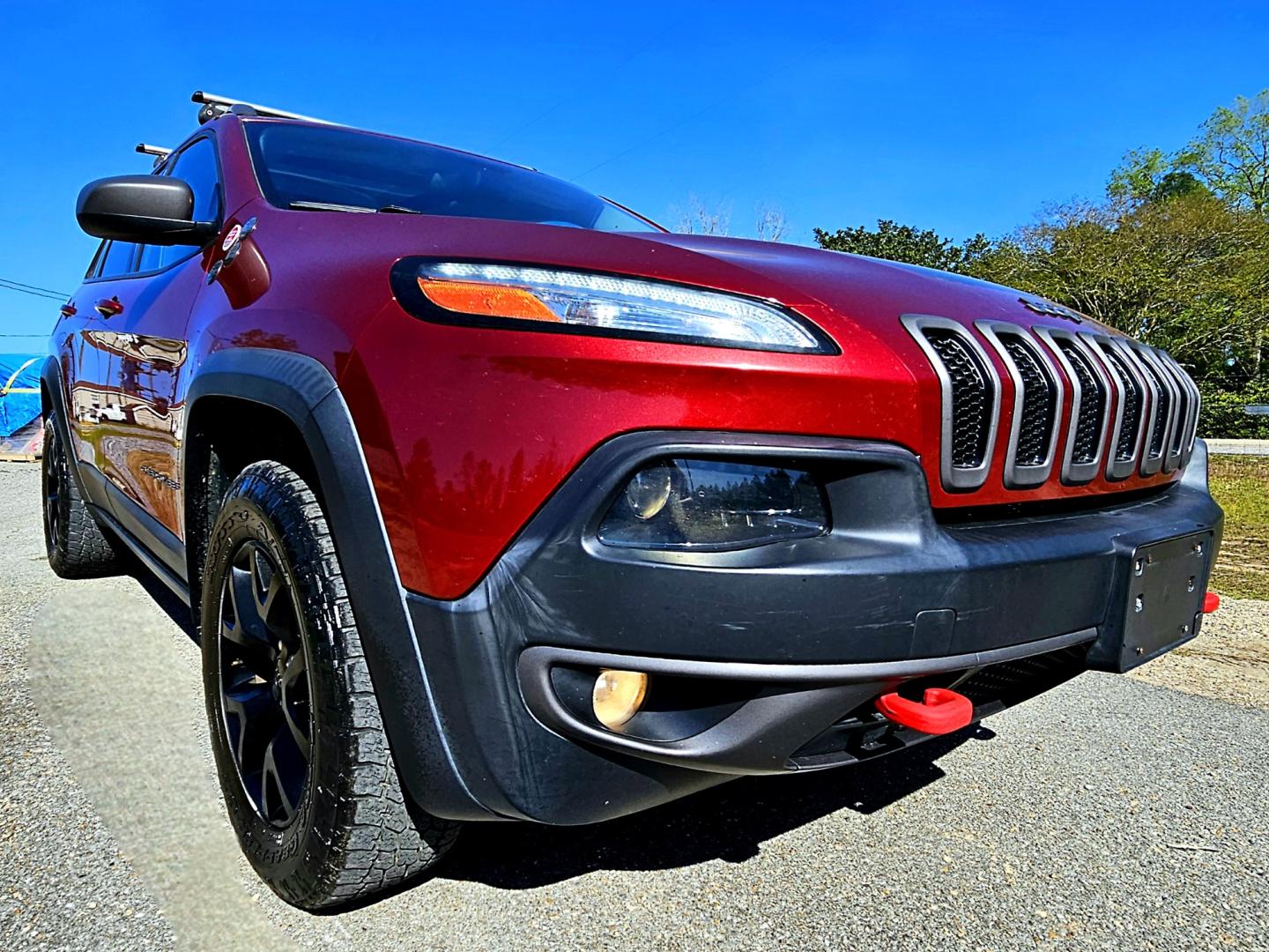 2014 Red Jeep Cherokee Trailhawk 4WD (1C4PJMBS2EW) with an 3.2L V6 DOHC 24V engine, 9-Speed Automatic transmission, located at 18001 Kellogg Rd, Saucier, MS, 39574, (228) 832-1441, 39.421459, -76.641457 - Photo#1